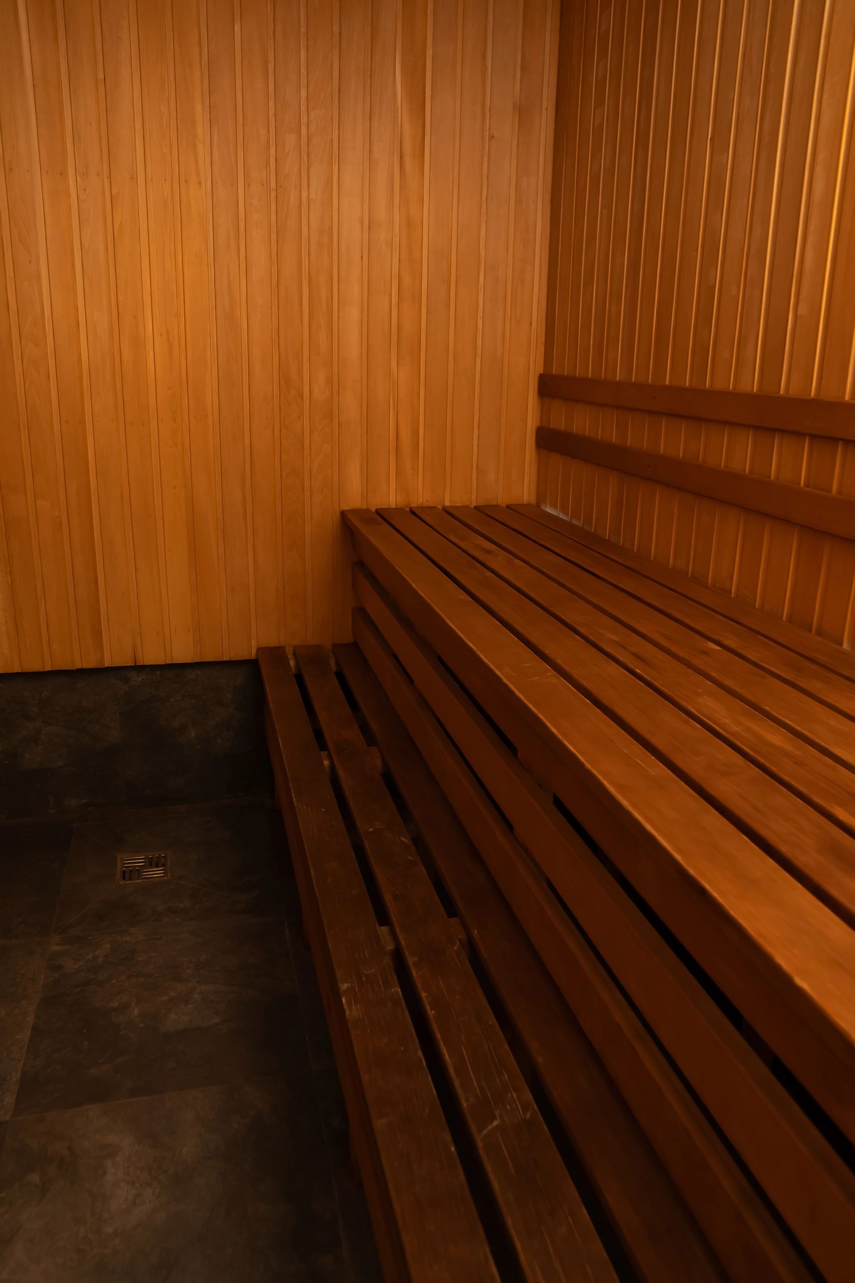 Warm wooden sauna interior representing wellness retreats in Thekkady